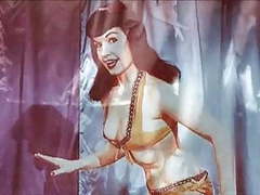 sGirls presents: Vintage: betty page and lucy kraven posing and wrestling