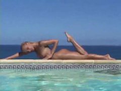 sGirls presents: Blonde strips from bikini and takes a dip