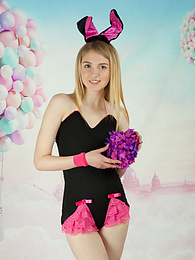 sGirls presents: This tight blonde bunny has some smoking hot fun with stripping her clothes and playing with her flower