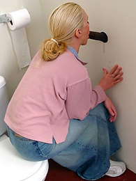 sGirls presents: Blonde girl Jamie sits on the toilet and blows a black gloryhole dong